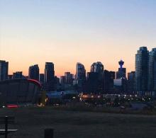 Calgary Tower lit up in Dystonia Blue